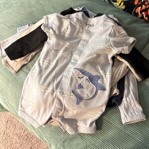 0-3 baby boy body suits. Some never worn. Others worn a couple times.